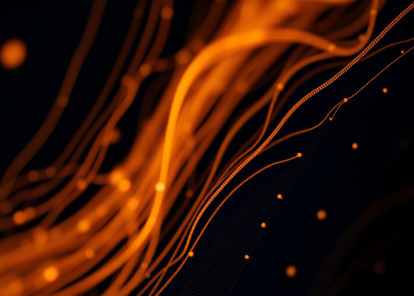 Abstract close-up of illuminated fibre-optic strands representing secure data transmission